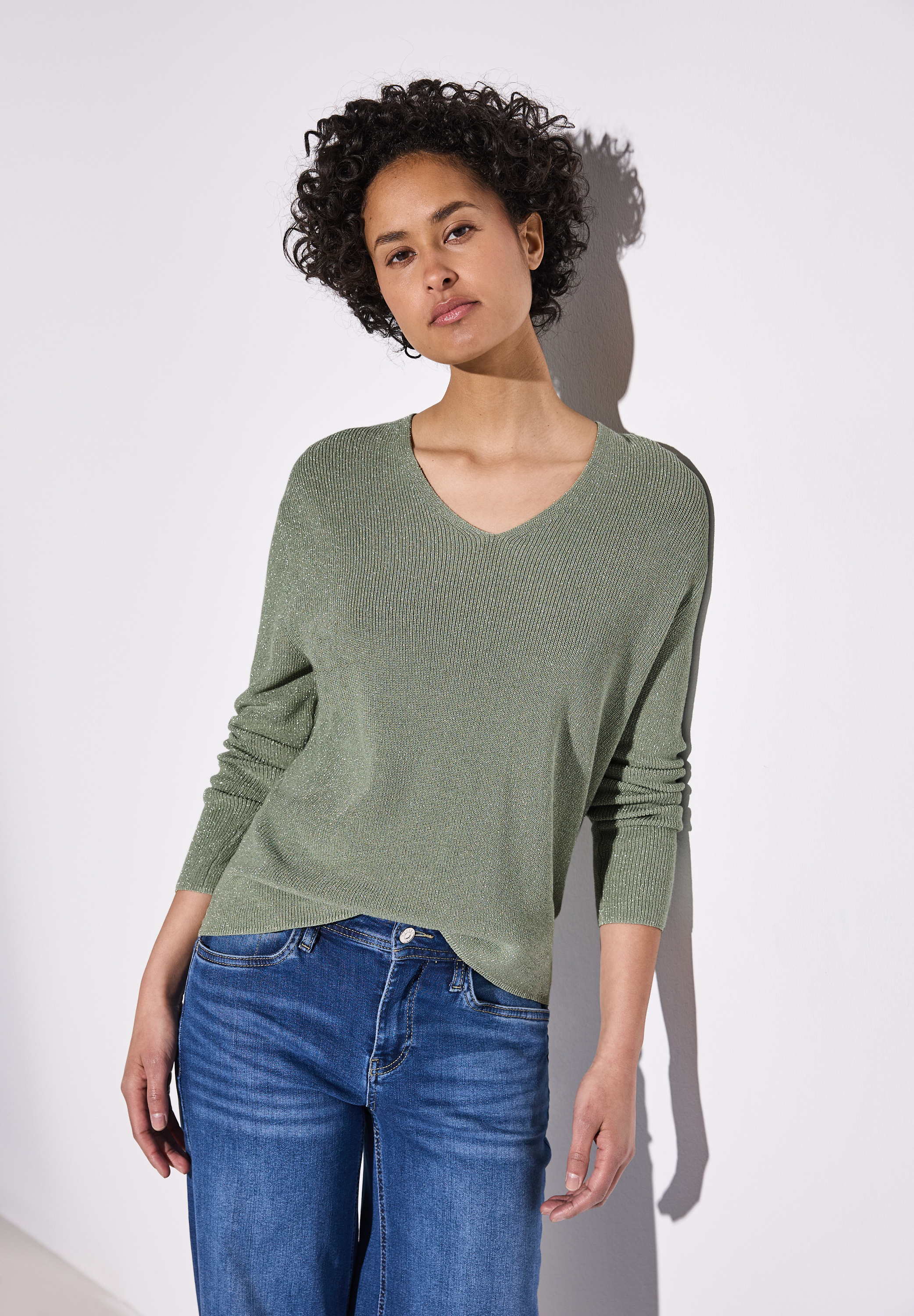 Glitzernder Pullover